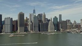 4.8K aerial stock footage of skyscrapers along the East River, Lower Manhattan, New York City Aerial Stock Footage | AX83_178