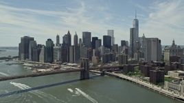 4.8K aerial stock footage approaching the Brooklyn Bridge and Lower Manhattan skyline, New York City Aerial Stock Footage | AX83_185