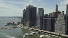 4.8K aerial stock footage of skyscrapers along the East River, Lower Manhattan, New York City Aerial Stock Footage | AX83_189