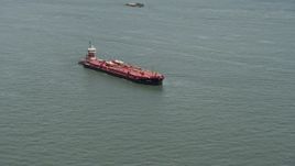 4.8K aerial stock footage of an oil tanker sailing New York Harbor, New York Aerial Stock Footage | AX83_203