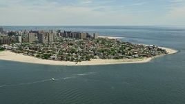 4.8K aerial stock footage flying by Coney Island neighborhoods and beaches, Brooklyn, New York City Aerial Stock Footage | AX83_210
