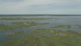 4.8K aerial stock footage flying over marshy islands in South Oyster Bay near Massapequa, New York Aerial Stock Footage | AX83_255E