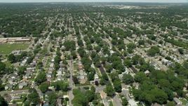 4.8K aerial stock footage flying over State Route 27 and suburban neighborhoods in Massapequa Park, New York Aerial Stock Footage | AX83_262E