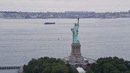 4K aerial stock footage of flying by the back side of the Statue of Liberty, New York, New York Aerial Stock Footage | AX84_009E