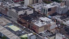 4K aerial stock footage Flying over shops in Harlem, New York, New York Aerial Stock Footage | AX84_038