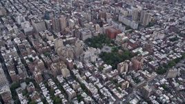 4K aerial stock footage Panning left across Washington Square Park, Greenwich Village, New York, New York Aerial Stock Footage | AX84_056