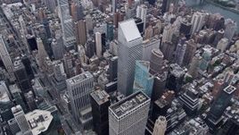 4K aerial stock footage fly over Midtown Manhattan skyscrapers, reveal Citigroup Center, New York City Aerial Stock Footage | AX84_064E