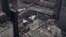 4K aerial stock footage Flying by World Trade Center Memorial, Lower Manhattan, New York, New York Aerial Stock Footage | AX84_085