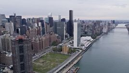 4K Aerial Video Flying by United Nations, Midtown Manhattan, New York, New York Aerial Stock Footage | AX84_136