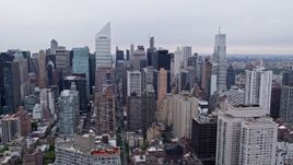 4K Aerial Video Flying by Midtown Manhattan skyscrapers, New York, New York Aerial Stock Footage | AX84_144