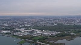 4K Aerial Video Flying by warehouses, Jersey City, New Jersey Aerial Stock Footage | AX84_168