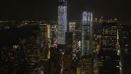4K aerial stock footage of World Trade Center, World Trade Center Memorial, Lower Manhattan, New York, night Aerial Stock Footage | AX85_014