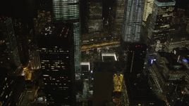 4K aerial stock footage of World Trade Center Memorial, World Trade Center, New York, New York, night Aerial Stock Footage | AX85_016