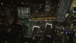 4K aerial stock footage of the World Trade Center Memorial, Lower Manhattan, New York, New York, night Aerial Stock Footage | AX85_029