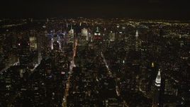 4K aerial stock footage Approaching Midtown Manhattan, New York, New York, night Aerial Stock Footage | AX85_034