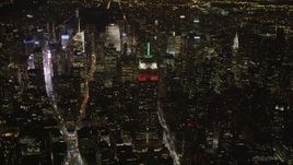 4K aerial stock footage Approaching Empire State Building, Midtown Manhattan, New York, New York, night Aerial Stock Footage | AX85_036