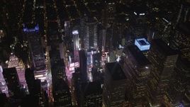 4K aerial stock footage Times Square, skyscrapers, Midtown Manhattan, New York, New York, night Aerial Stock Footage | AX85_040