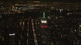 4K aerial stock footage Empire State Building, Chrysler Building, Midtown Manhattan, New York, night Aerial Stock Footage | AX85_055