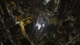 4K aerial stock footage Bird's eye view of Chrysler Building, Midtown Manhattan, New York, New York, night Aerial Stock Footage | AX85_063