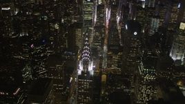 4K aerial stock footage Flying by Chrysler Building, Midtown Manhattan, New York, New York, night Aerial Stock Footage | AX85_068