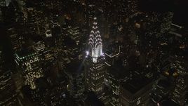 4K aerial stock footage Orbiting the Chrysler Building, Midtown Manhattan, New York, New York, night Aerial Stock Footage | AX85_070