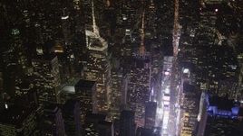 4K aerial stock footage Bank of America Tower, Times Square, Midtown Manhattan, New York, night Aerial Stock Footage | AX85_073