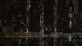 4K aerial stock footage Bird's eye view over city streets, Midtown Manhattan, New York, New York, night Aerial Stock Footage | AX85_098