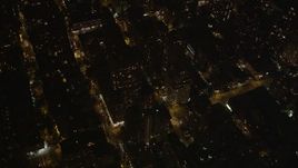 4K aerial stock footage Pan across Upper East Side, reveal Midtown Manhattan, New York, New York, night Aerial Stock Footage | AX85_103