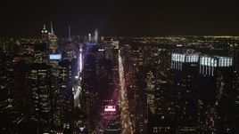 4K aerial stock footage Fly by Times Square, skyscrapers, Midtown Manhattan, New York, New York, night Aerial Stock Footage | AX85_107