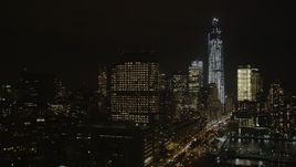 4K aerial stock footage Approaching One World Trade Center, Lower Manhattan, New York, New York, night Aerial Stock Footage | AX85_119