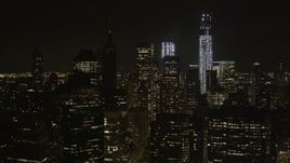 4K aerial stock footage Fly by One World Trade Center, Lower Manhattan, New York, New York, night Aerial Stock Footage | AX85_130