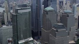 4K aerial stock footage of tilting to World Trade Center buildings in Lower Manhattan, New York City Aerial Stock Footage | AX86_009