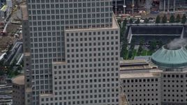 4K aerial stock footage flyby skyscraper to reveal WTC Memorial in Lower Manhattan, New York City Aerial Stock Footage | AX86_010