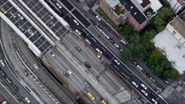4K aerial stock footage of a bird's eye view of traffic on the Brooklyn Bridge Promenade, Lower Manhattan, New York City Aerial Stock Footage | AX86_017