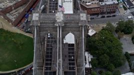 4K aerial stock footage of a bird's eye view of traffic on the Brooklyn Bridge into Brooklyn, New York City Aerial Stock Footage | AX86_018