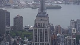 4K aerial stock footage of the Empire State Building's observation decks in Midtown Manhattan, New York City Aerial Stock Footage | AX86_033