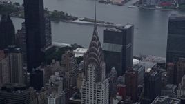 4K aerial stock footage of approaching the top of the Chrysler Building in Midtown Manhattan, New York City Aerial Stock Footage | AX86_039