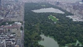 4K aerial stock footage tilt from Central Park West to reveal Central Park, New York City Aerial Stock Footage | AX86_052