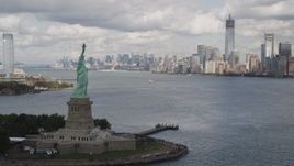 4K aerial stock footage Orbit Statue of Liberty, Lower Manhattan skyline, New York, New York Aerial Stock Footage | AX87_013