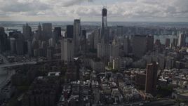 4K aerial stock footage Tilt up from Lower East Side, revealing Lower Manhattan, New York, New York Aerial Stock Footage | AX87_023