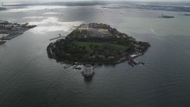 4K aerial stock footage Approaching Governors Island, New York Bay, New York, New York Aerial Stock Footage | AX87_040
