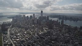 4K aerial stock footage Flying by Lower Manhattan, seen from Lower East Side, New York, New York Aerial Stock Footage | AX87_054