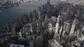 4K aerial stock footage Flying away from skyscrapers in Lower Manhattan, New York, New York Aerial Stock Footage | AX87_061