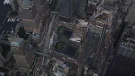 4K aerial stock footage Tilt down on World Trade Center Memorial, Lower Manhattan, New York, New York Aerial Stock Footage | AX87_069