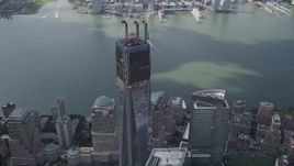 4K aerial stock footage Flying by top of One World Trade Center, Lower Manhattan, New York, New York Aerial Stock Footage | AX87_071
