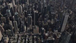 4K aerial stock footage Tilt up to reveal Midtown Manhattan skyscrapers, New York, New York Aerial Stock Footage | AX87_090