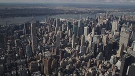 4K aerial stock footage Approaching the Empire State Building, Midtown Manhattan, New York, New York Aerial Stock Footage | AX87_098