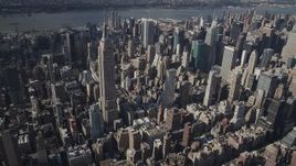 4K aerial stock footage Approaching the Empire State Building, Midtown Manhattan, New York, New York Aerial Stock Footage | AX87_099