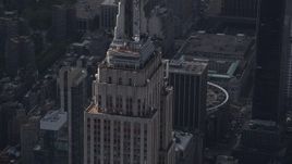 4K aerial stock footage Fly by top decks of the Empire State Building, Midtown Manhattan, New York Aerial Stock Footage | AX87_109