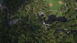 4K aerial stock footage Bird's eye view over Delacorte Theater, Turtle Pond, Central Park, New York Aerial Stock Footage | AX87_121